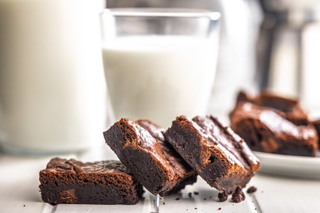 Homemade chocolate brownies on a white table.の写真素材