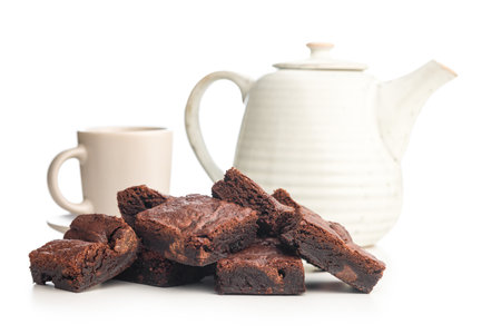 Homemade chocolate brownies and coffee cup isolated on a white background.の写真素材