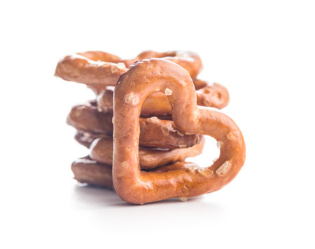Heart shaped pretzel isolated on a white background.の写真素材
