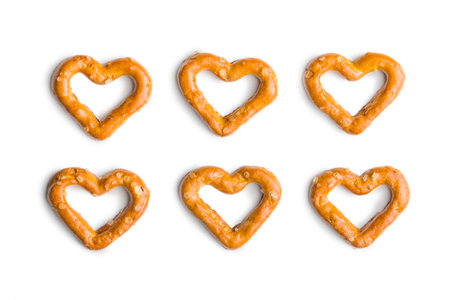 Heart shaped pretzels isolated on a white background.の写真素材