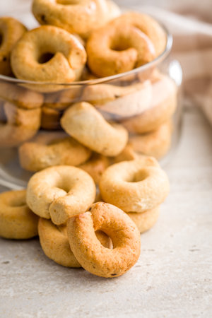 Crispy snack rings on a kitchen table.の写真素材