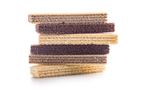 Sweet wafers filled with chocolate and vanilla cream isolated on a white background.の写真素材