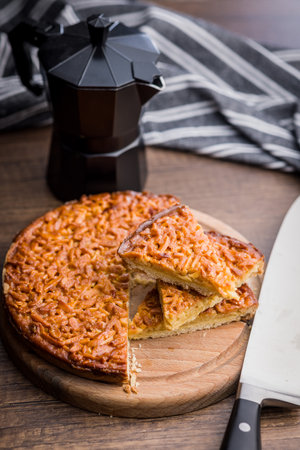 Sweet almond pie on a wooden table.の写真素材