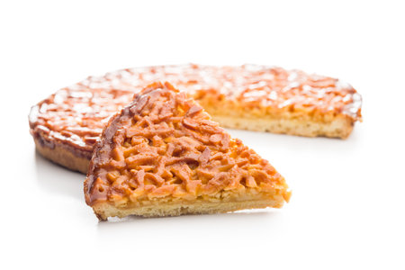 Sweet almond pie isolated on a white background.の写真素材