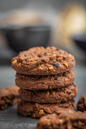 Sweet chocolate cookies on a kitchen table.