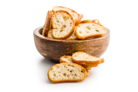 Crispy roasted bruschetta bread on a white background.の写真素材