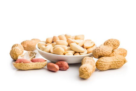 Peanuts in shell. Groundnuts isolated on a white background.の写真素材