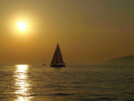yacht in the sunsetの写真素材