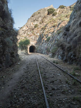 old train tunnel through the mountainsの写真素材