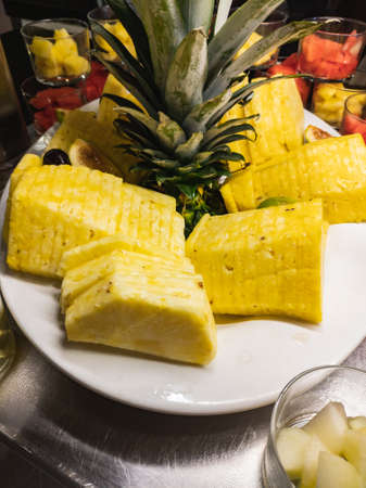 Catering: Buffet tray with sliced pineapple chunksの写真素材