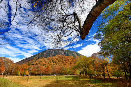 Beautiful landscape view of Mount Nantai with colorful autumn foliage at Lake Chuzenji in Nikko, Tochigi prefecture, Japanの写真素材