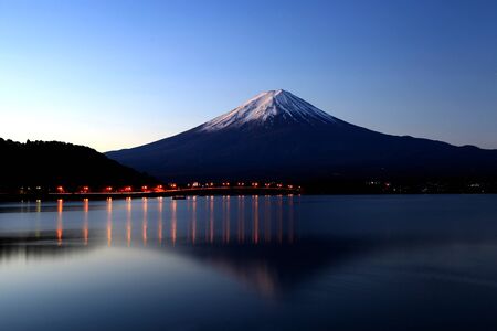 Mount Fuji in the early morning sunrise at the northern shores of Lake Kawaguchi in Yamanashi, Japanの写真素材