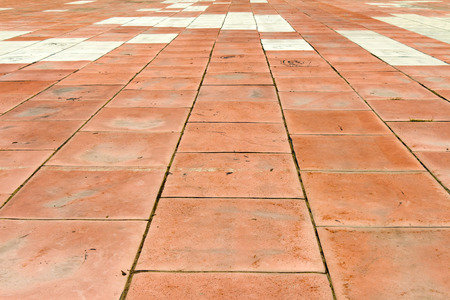 Playground with rubber mats (panels) for security. Long-abandoned (old). The background is blurred.の写真素材