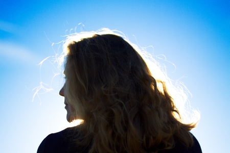 portrait of pretty young woman from behind