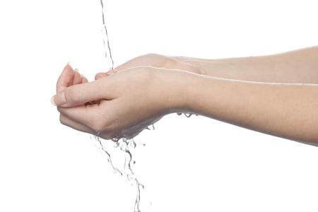 Woman washing her hands - white backgroundの写真素材