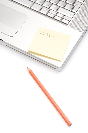 To do list on laptop - office worker task conceptの写真素材