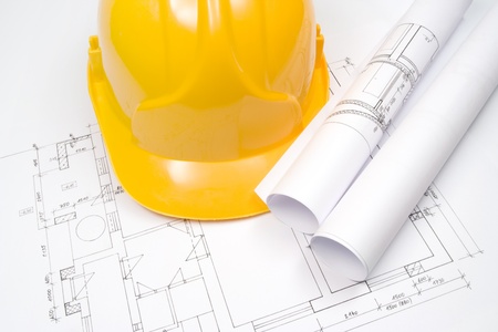 Blueprints of architecture and protective helmetの写真素材