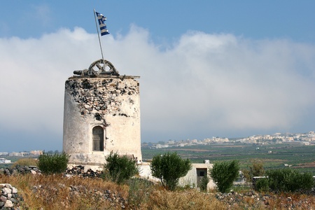 Typical ruin of windmill on Greek island Santorini (horizontal composition)の写真素材