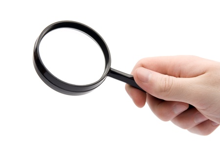 Searching - Magnifying glass hold in right handの写真素材