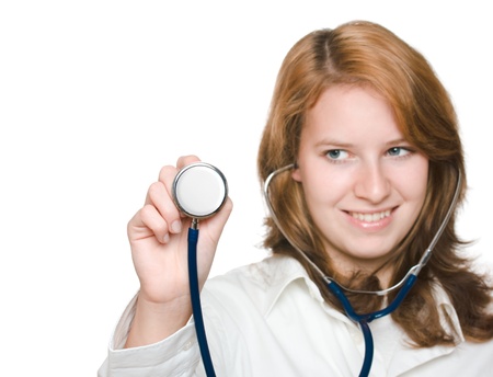 Medical concept - young woman doctor with stethoscope, selective focusの写真素材