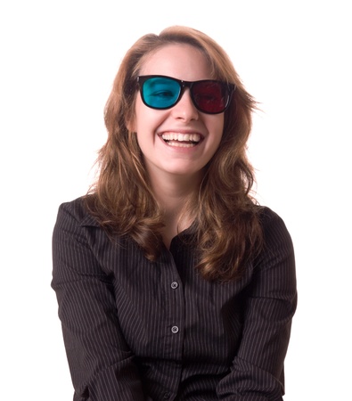 Laughing young woman with anaglyph 3-D glassesの写真素材