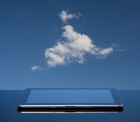 Cloud computing concept  Tablet computer and cloud の写真素材