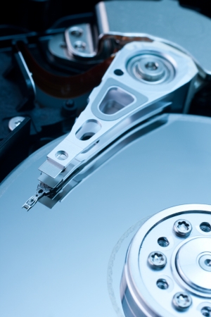 Studio shot of hard disk  hard drive, hard disk drive   Blue tint  の写真素材