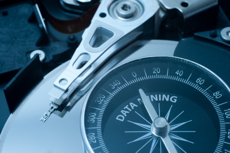 Data mining concept. Hard disk drive and compass. Compass needle point at data mining.
の写真素材