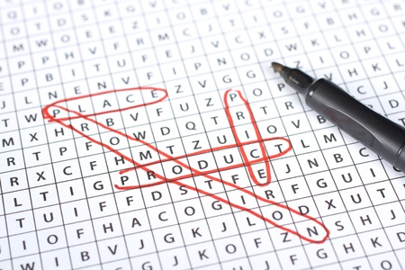 Marketing mix (4P) - product, price, place, promotion highlighted in word search game. Focused on word product.の写真素材
