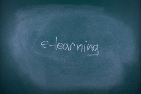 Writing e-learning on school chalkboard  blackboard   の写真素材