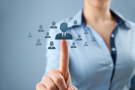 Human resources, CRM and social networking concept - female officer choose person  employee  represented by icon の写真素材