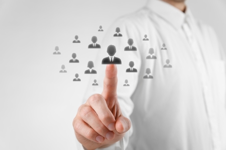 Human resources officer choose employee standing out of the crowd. Select team leaderor assessment center concept. Gender discrimination in employees selection.
の写真素材