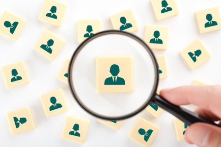 Human resources, personal audit and assessment center concept - recruiter look for employee represented by icon.
の写真素材