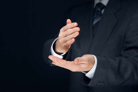 Nonverbal communication. Stop it, deny, refuse and make crisp cut gesture of businessman.
の写真素材