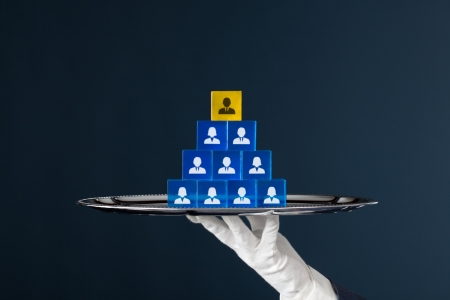 Human resources put on a tray. Team composition, team configuration and corporate hierarchy concepts.の写真素材