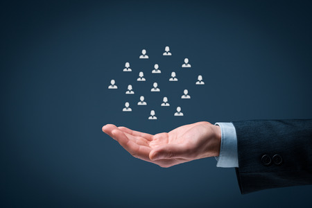 Offer gesture of businessman or personnel and icons representing group of people の写真素材