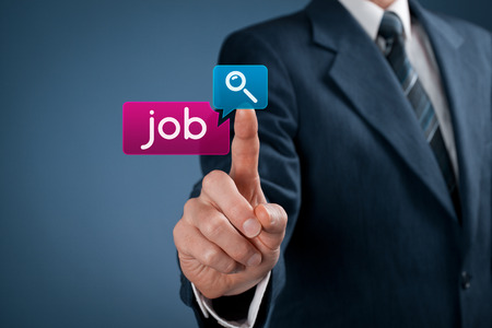 Job seeking concept  Businessman click on magnifying glass icon and job button の写真素材