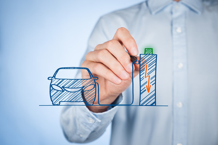 Man draw an Electric car recharge a battery in recharge station (charge point).の写真素材
