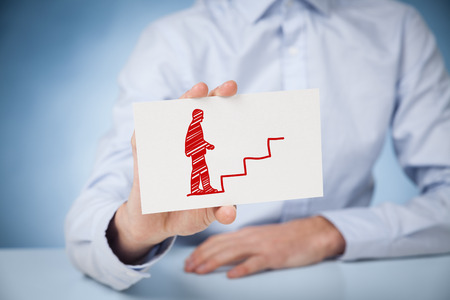 Personal development, personal and career growth, success, progress and potential concepts. Coach (human resources officer, supervisor) help employee with his growth symbolized by stairs.の写真素材