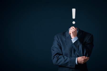 Businessman has idea. An idea is represented by exclamation mark.の写真素材