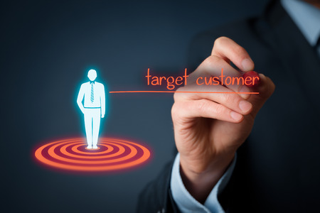 Target customer (marketing) concept. Customer represented by virtual icon of man standing on target.の写真素材