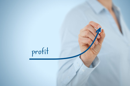 Increase profit concept. Businesswoman plan (predict) profit growth represented by graph.の写真素材