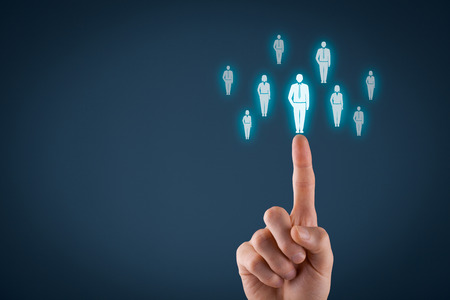 Human resources officer choose employee standing out of the crowd. Select team leader concept. Male hand click on man icon. Negative space in left side, blue background.の写真素材