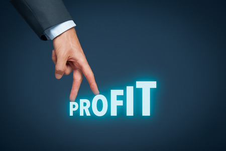 Increase profit concept. Businessman represented by hand rise on increasing letters on word profit.の写真素材