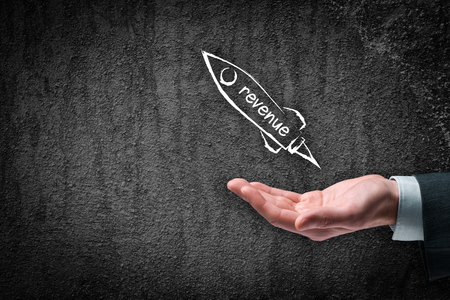 Increase revenue concept. Businessman help to speedily increase revenue. Spaceship representing dynamic growth.の写真素材