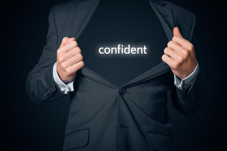 Confident businessman concept. Boastful manager with opened suit and text confident instead body.の写真素材