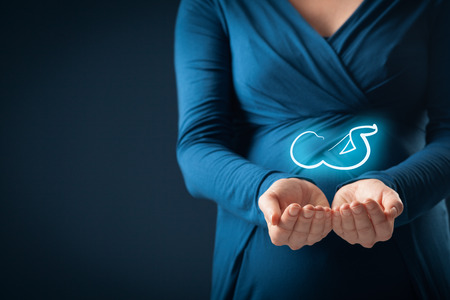 Maternity insurance business and pregnancy care concept.の写真素材