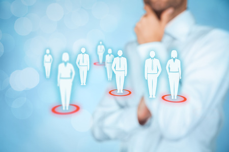 Target audience (marketing) concept. Businessman think about target audience and customers.の写真素材