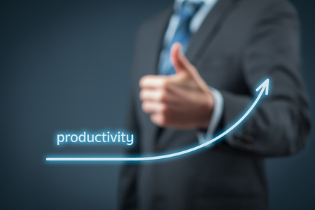 Manager (businessman, coach, leadership) is satisfied with company productivity increase.の写真素材