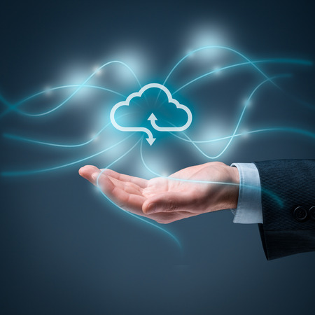 Cloud computing concept - connect to cloud. Hand with cloud computing icon, square composition.の写真素材